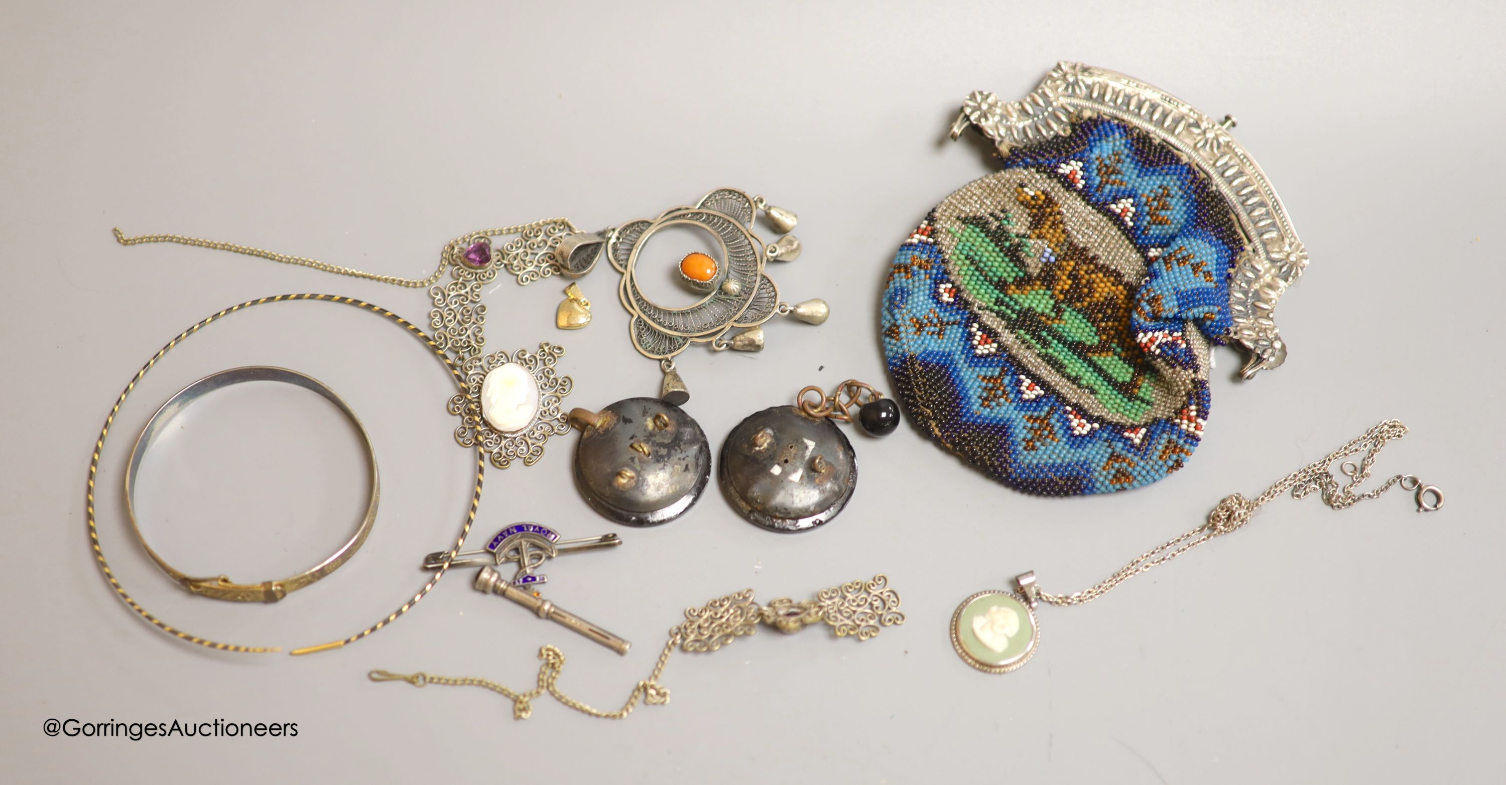 A white metal mounted beadwork purse and other minor jewellery, including Royal Navy sweethearts brooch.